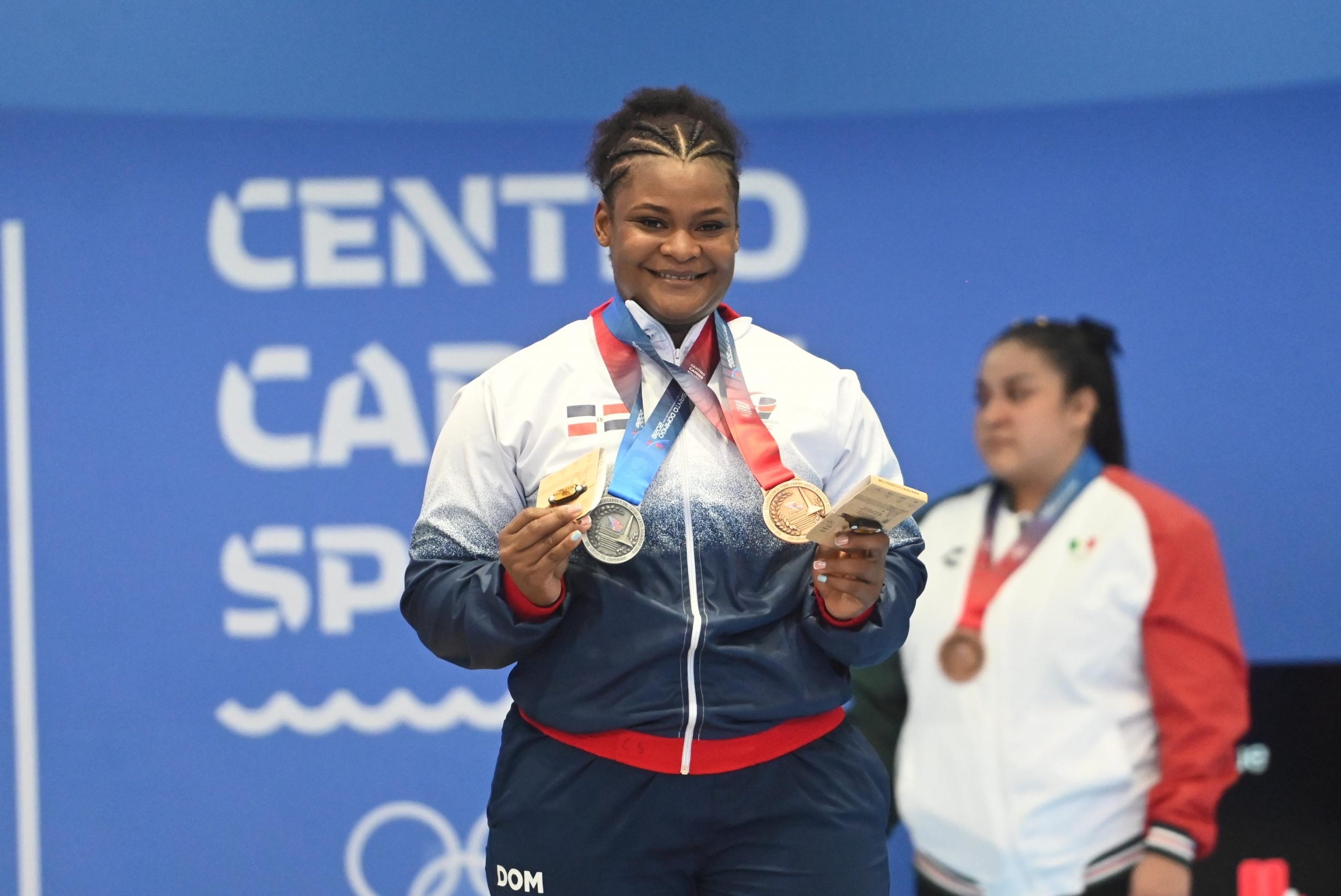 Crismery Santana se va con medalla de plata y bronce en pesas; Ezequiel Germán dos bronceadas